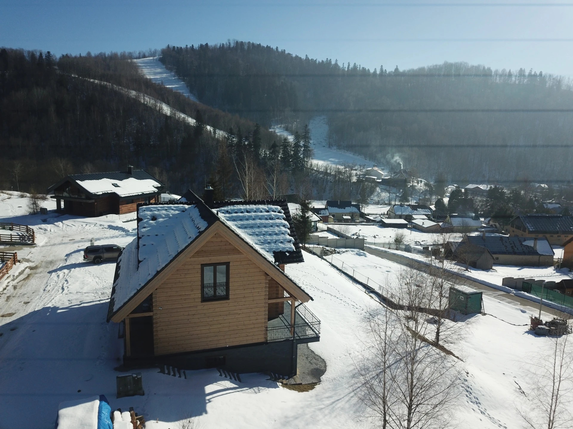 The snow-covered Chalet Martuška log cabin in the Levoča Valley.